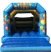 light and dark blue party themed bouncy castle for hire